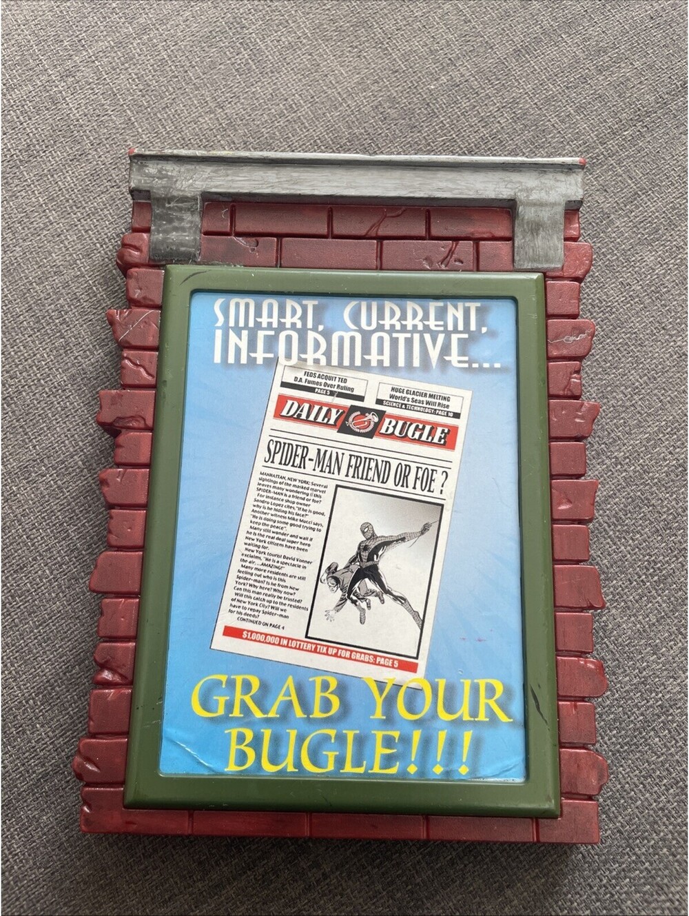 2003 Marvel Legends Spiderman Extendable Brick Wall Grab Your Bugle Poster 6.5"